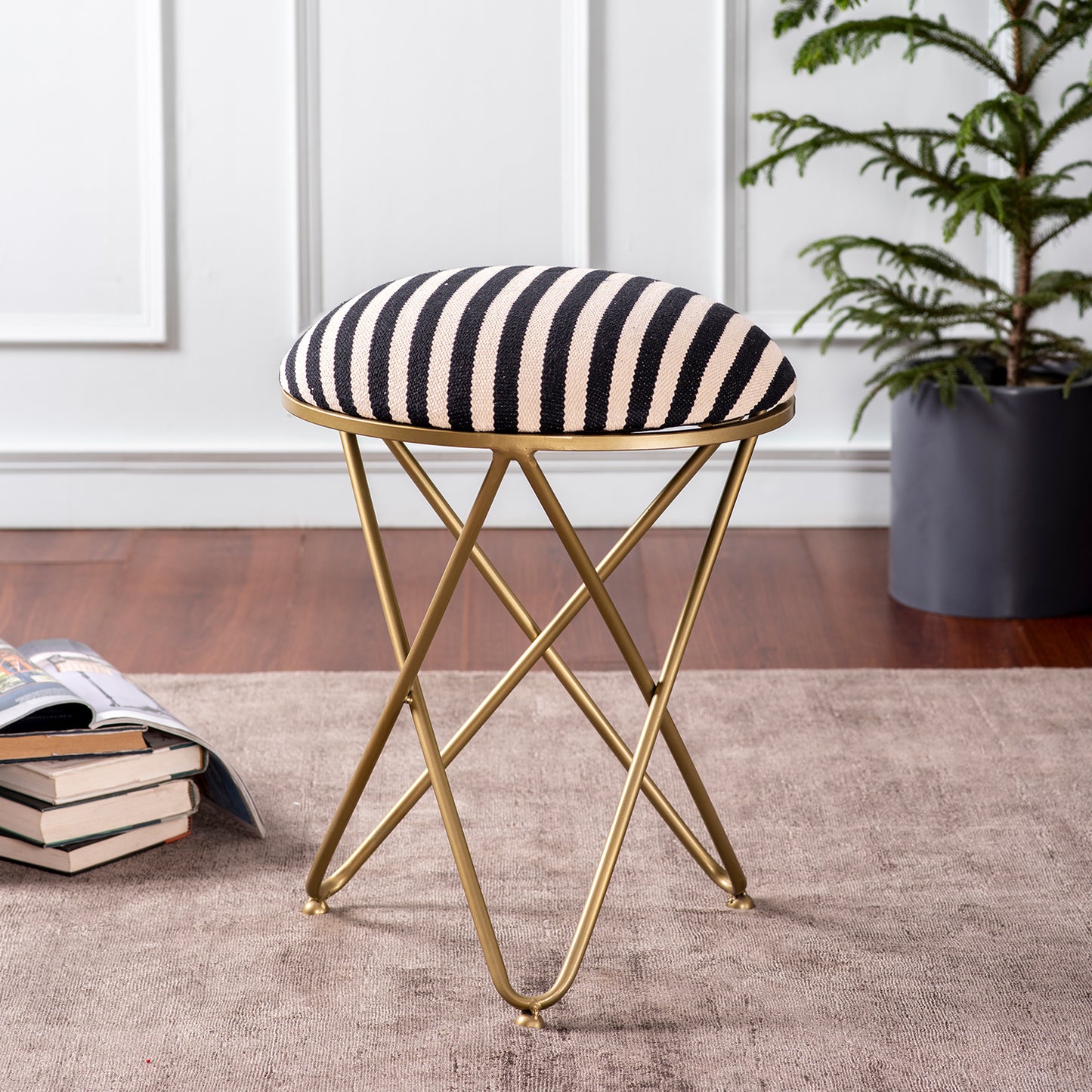Metallic cross leg ottoman