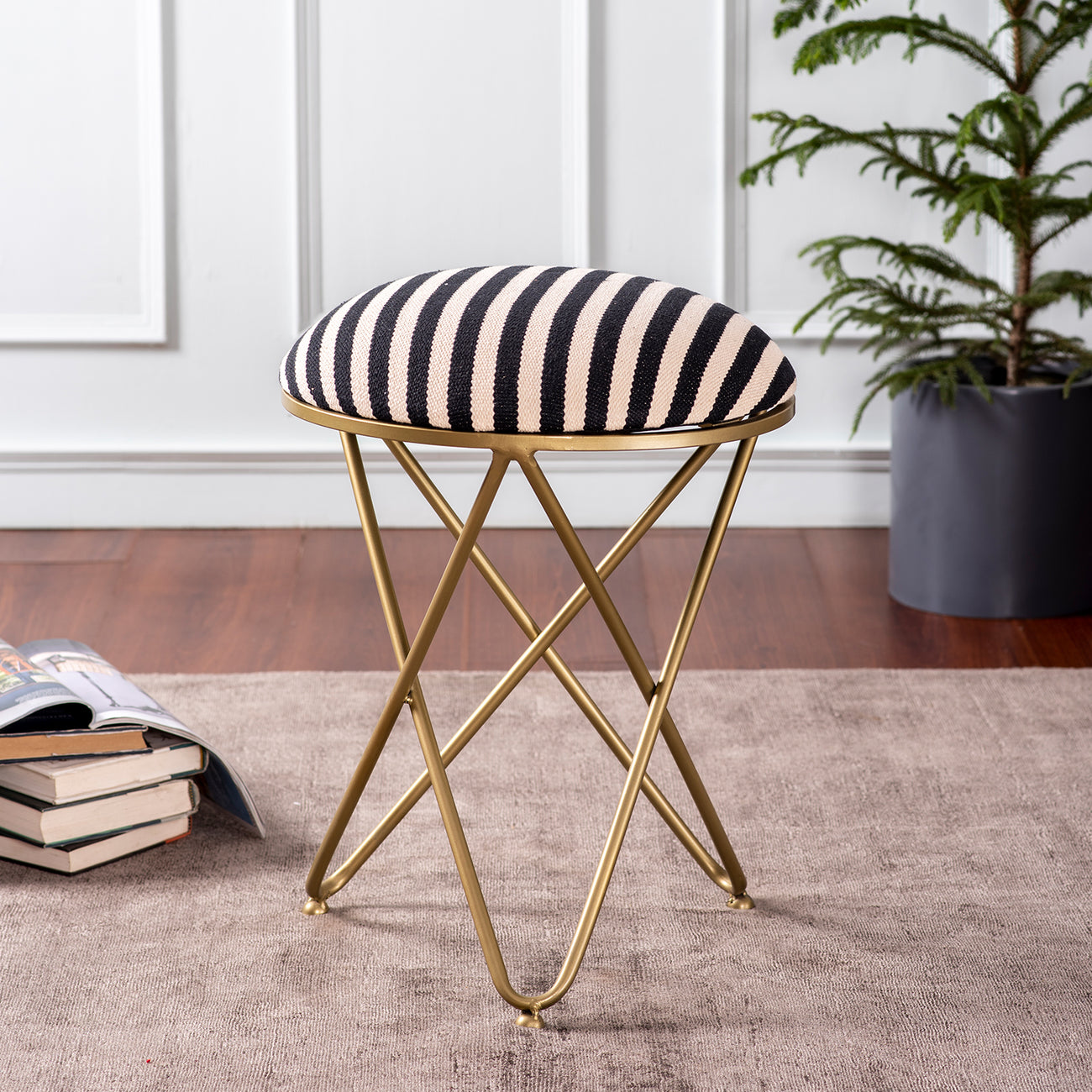 Metallic cross leg ottoman