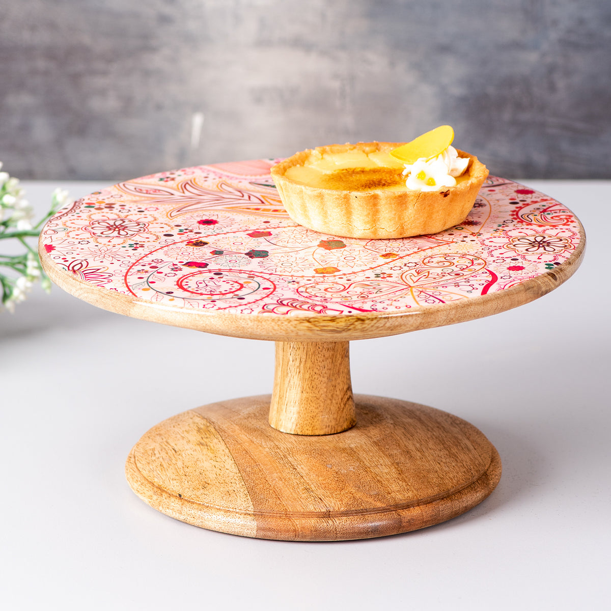 pink printed wooden cake stand