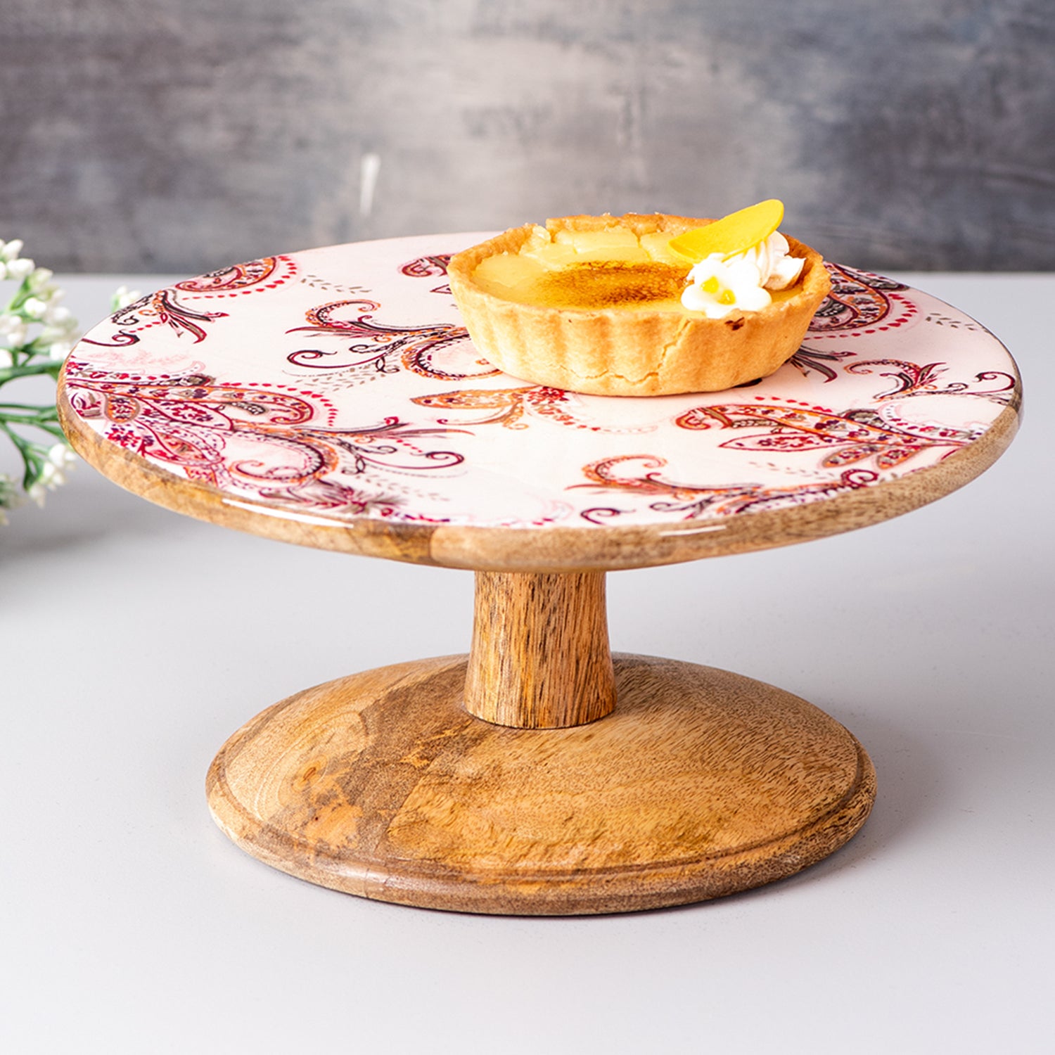 pink printed wooden cake stand